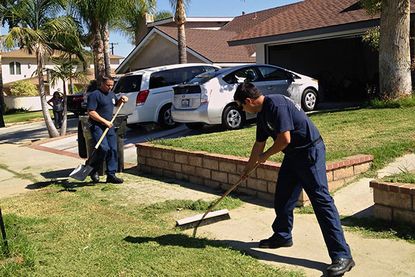 California firefighters help man who collapsed while mowing lawn &mdash; then finish his yard work