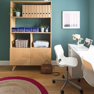 green home office with desk
