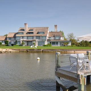 sloping roof house near lake