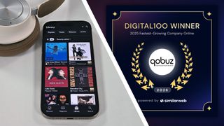 A phone with the Qobuz app on it, with a sign showing Qobuz is a Digital100 winner from Similarweb