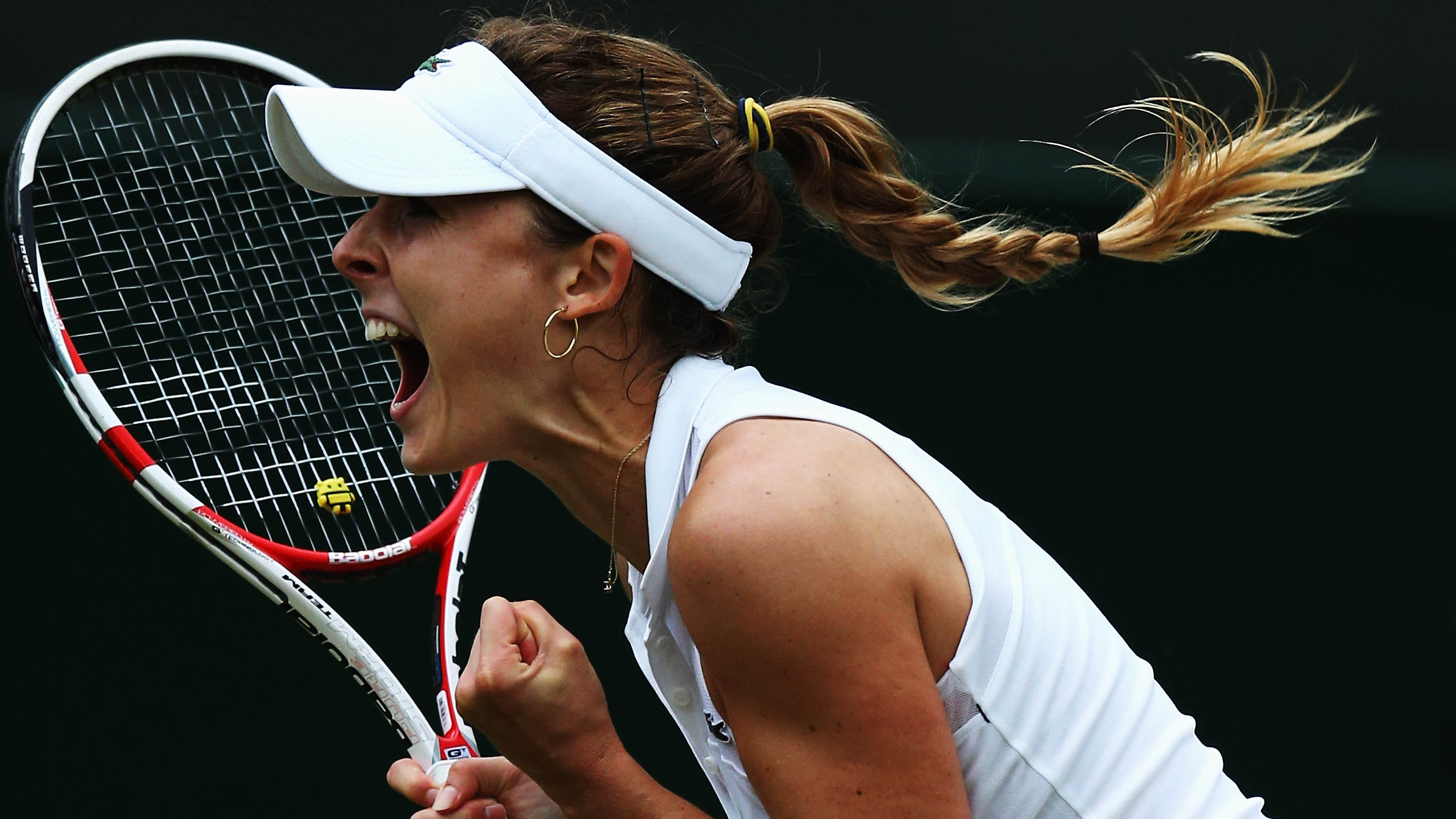 Sabine Lisicki celebrating after winning a rally