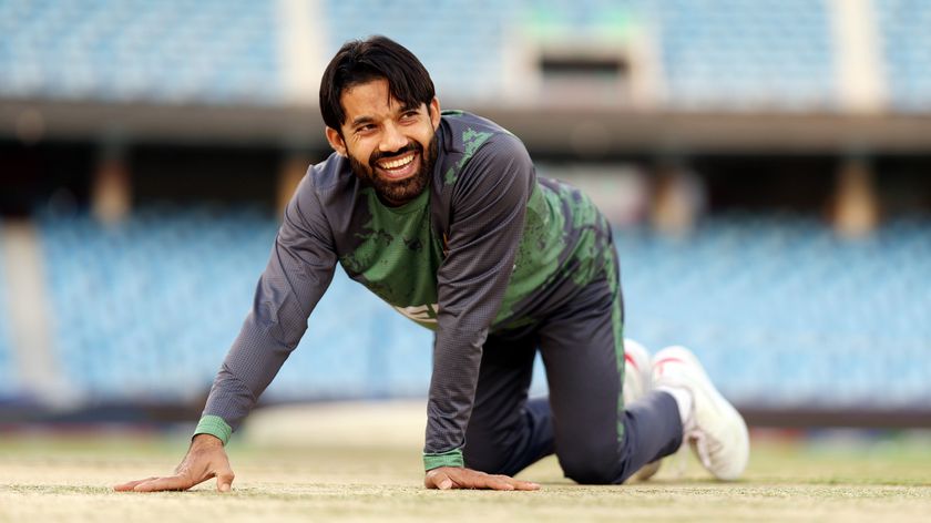 DUBAI,UNITED ARAB EMIRATES- FEBRUARY 22: Mohammad Rizwan of Pakistan inspects the pitch during a Pakistan Net Session ahead of India v Pakistan at Dubai International Stadium on February 22, 2025 in Dubai, United Arab Emirates. 