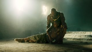Dwayne Johnson's Teth-Adam holding son's lifeless body in Black Adam movie