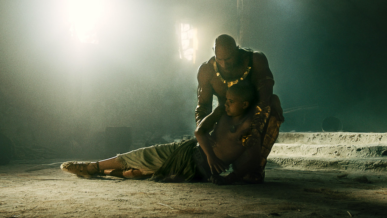 Dwayne Johnson's Teth-Adam carries his dead son's body in Black Adam