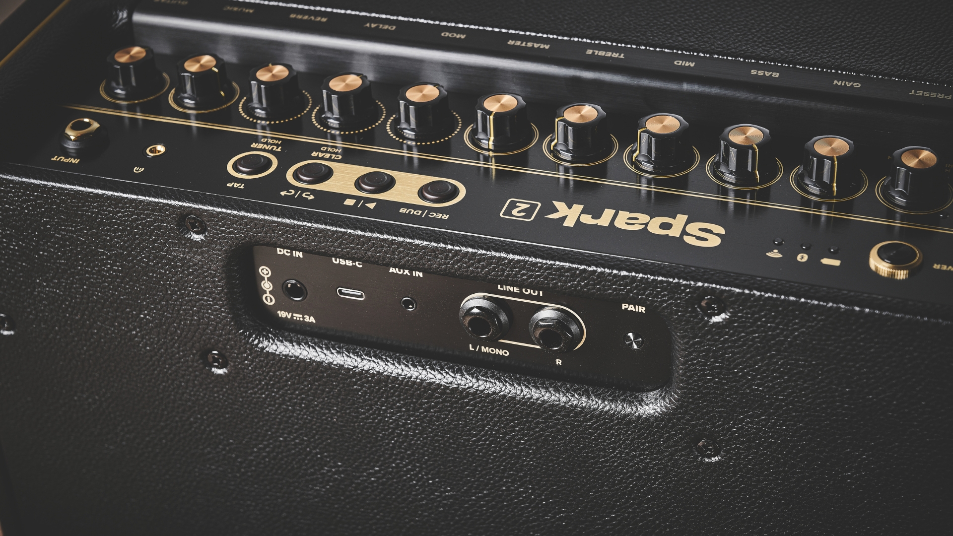 The back panel and top controls of a Positive Grid Spark 2 combo amp