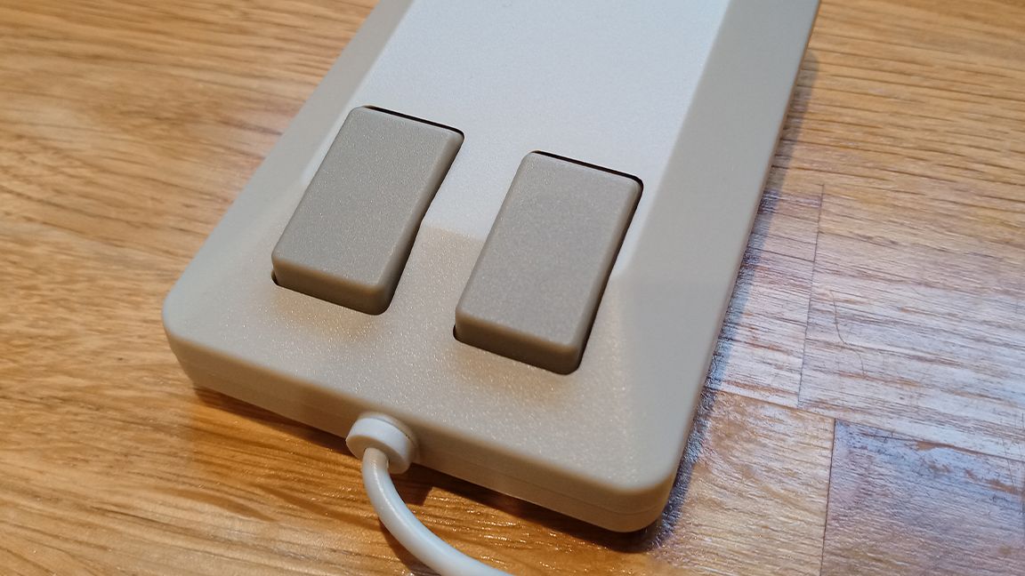 A photo of the A500 MIni USB mouse on a wooden table