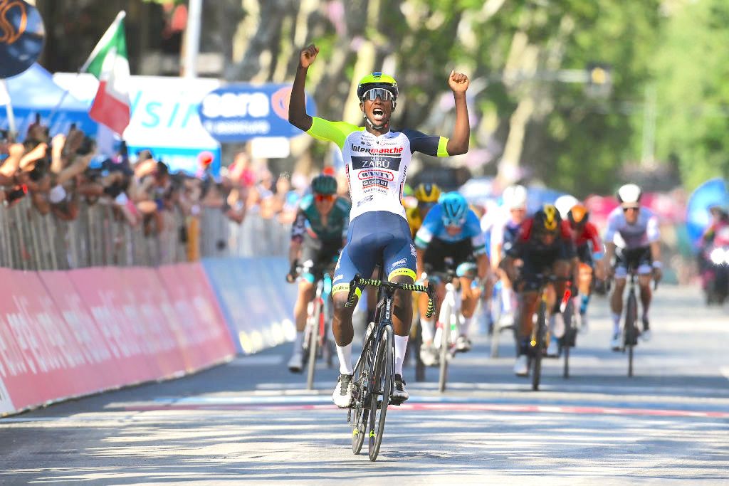 JESI, ITALY - MAY 17: (L-R) Hailu Biniam Girmay of Eritrea and Team Intermarch&Atilde;&copy; - Wanty - Gobert Mat&Atilde;&copy;riaux celebrates at finish line as stage winner ahead of Mathieu Van Der Poel of Netherlands and Team Alpecin - Fenix during the 105th Giro d'Italia 2022, Stage 10 a 196km stage from Pescara to Jesi 95m / #Giro / #WorldTour / on May 17, 2022 in Jesi, Italy. (Photo by Tim de Waele/Getty Images)