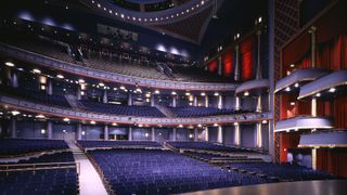 The venue’s house-right L-Acoustics K3 loudspeaker array, with the Kara II center array and KS21 sub hangs seen in the background.