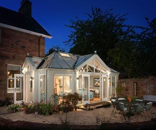 white conservatory with multi-angled roof designs