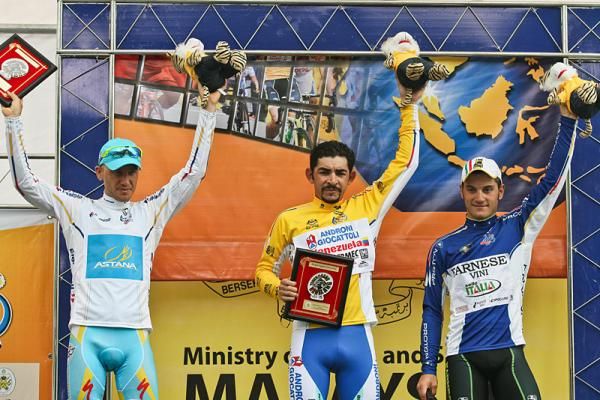 Classification leaders (l-r): Alexsandr Dyachenko, best Asian rider; Jose Serpa, overall leader; Andrea Guardini, points leader