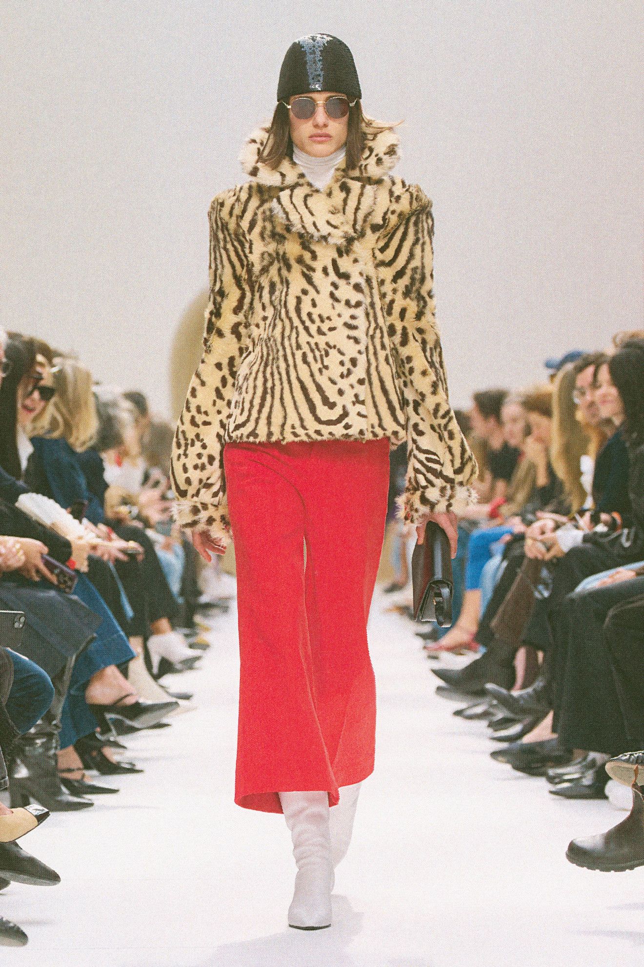 a model walks the celine f/w 26 runway.