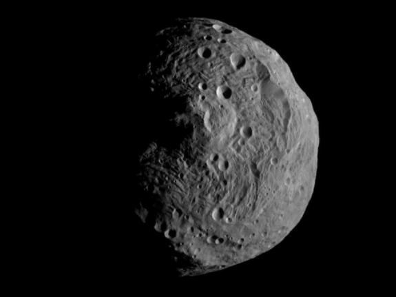 NASA's Dawn spacecraft obtained this image with its framing camera on July 17, 2011. It was taken from a distance of about 9,500 miles (15,000 kilometers) away from the protoplanet Vesta. Each pixel in the image corresponds to roughly 0.88 miles (1.4 kilo