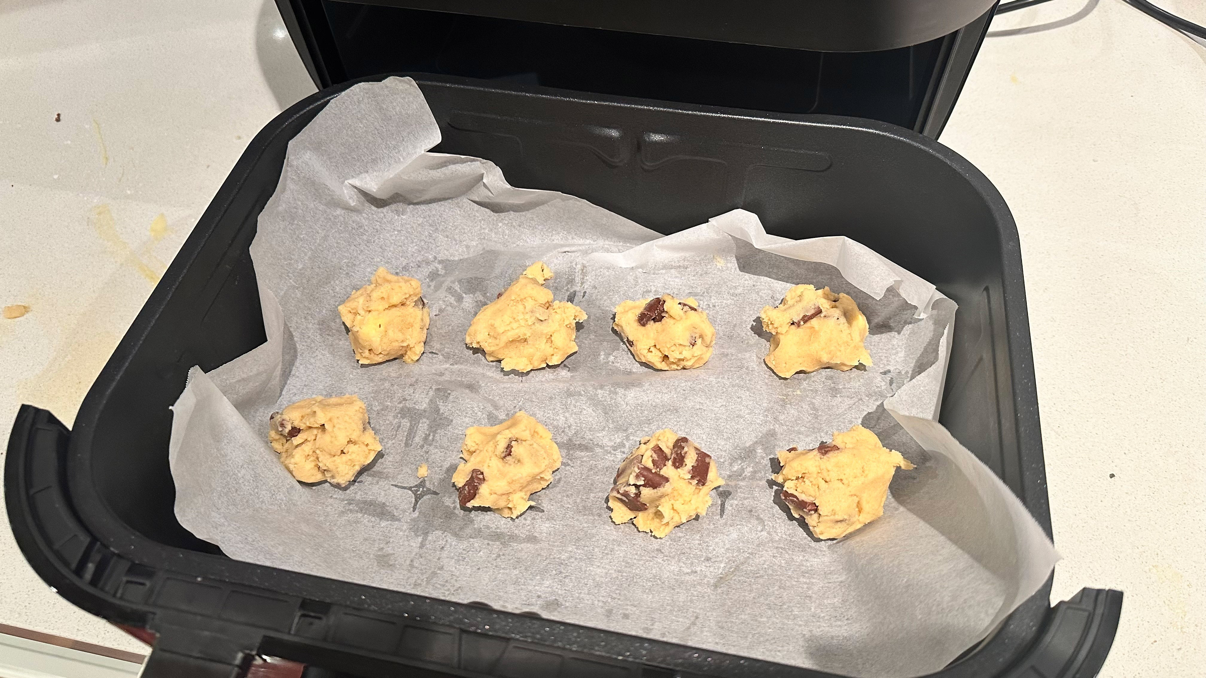Cookie dough before and after being baked in the Instant Vortex VersaZone Air Fryer