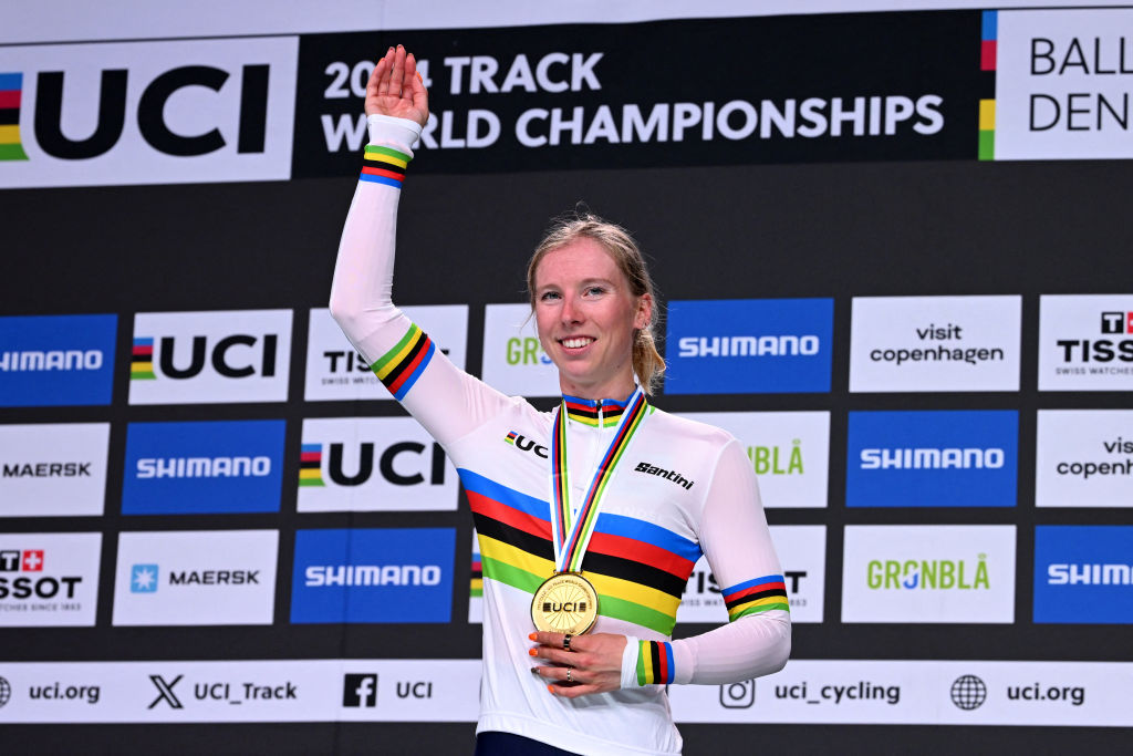 Winner Netherlands' Lorena Wiebes celebrates on the podium after the women's scratch race of the UCI Track Cycling World Championships in Ballerup, Denmark, on October 16, 2024. (Photo by Jonathan NACKSTRAND / AFP)