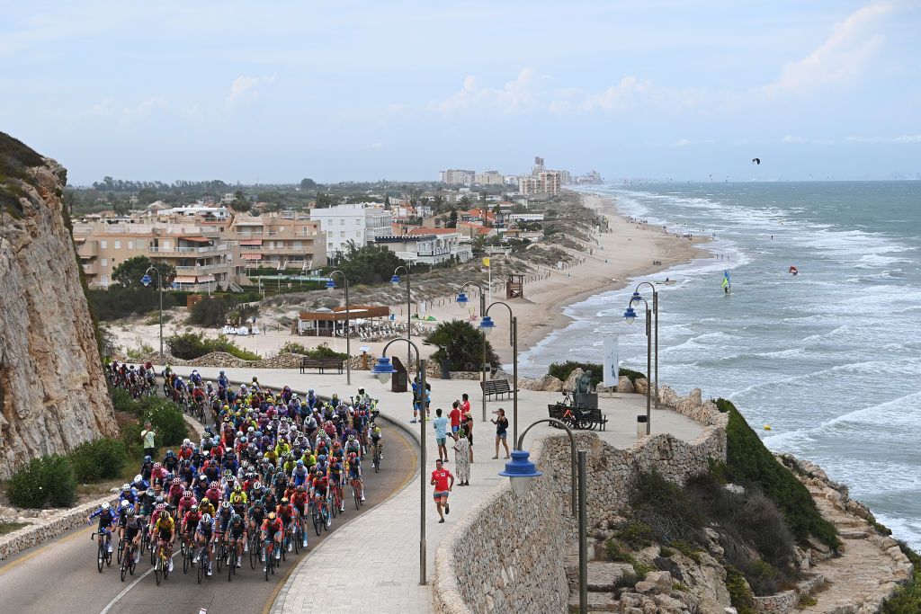 OLIVA SPAIN SEPTEMBER 01 A general view of the peloton passing through Cullera city during the 78th Tour of Spain 2023 Stage 7 a 2008km stage from Utiel to Oliva UCIWT on September 01 2023 in Oliva Spain Photo by Tim de WaeleGetty Images