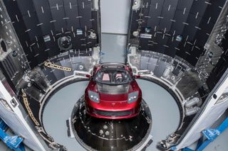 SpaceX CEO Elon Musk's midnight cherry red Tesla Roadster, which will be launched into space on the first Falcon Heavy rocket test flight, is seen before encapsulation inside its protective payload fairing. SpaceX's debut Falcon Heavy rocket will launch i