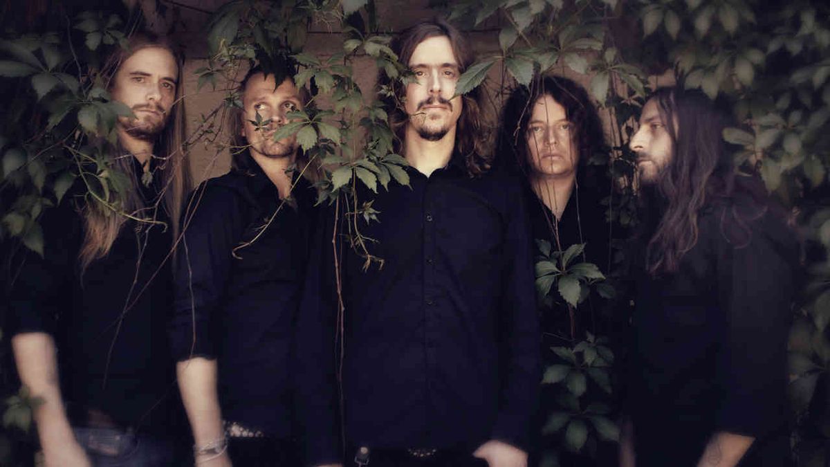 Opeth posing for a photograph in 2011