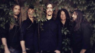 Opeth posing for a photograph in 2011