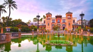 A beautiful garden with Moorish architecture in Seville, Andalusia