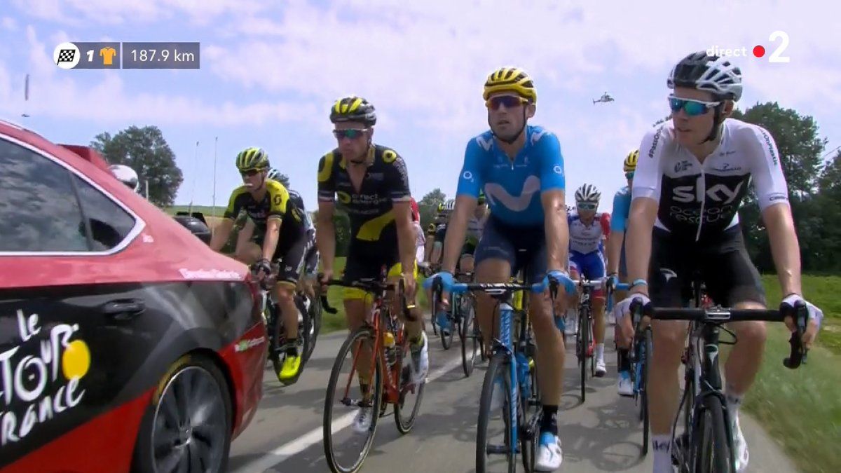 The riders came to a halt behind the race directors car