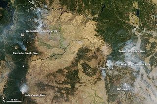 NASA's Aqua satellite captured this image of Montana's Dugan fire on Sept. 15, 2012. The fire formed towering pyrocumulus clouds.