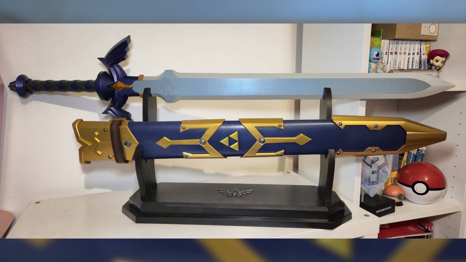 Photo of the Bandai Proplica Master Sword in its display stand.
