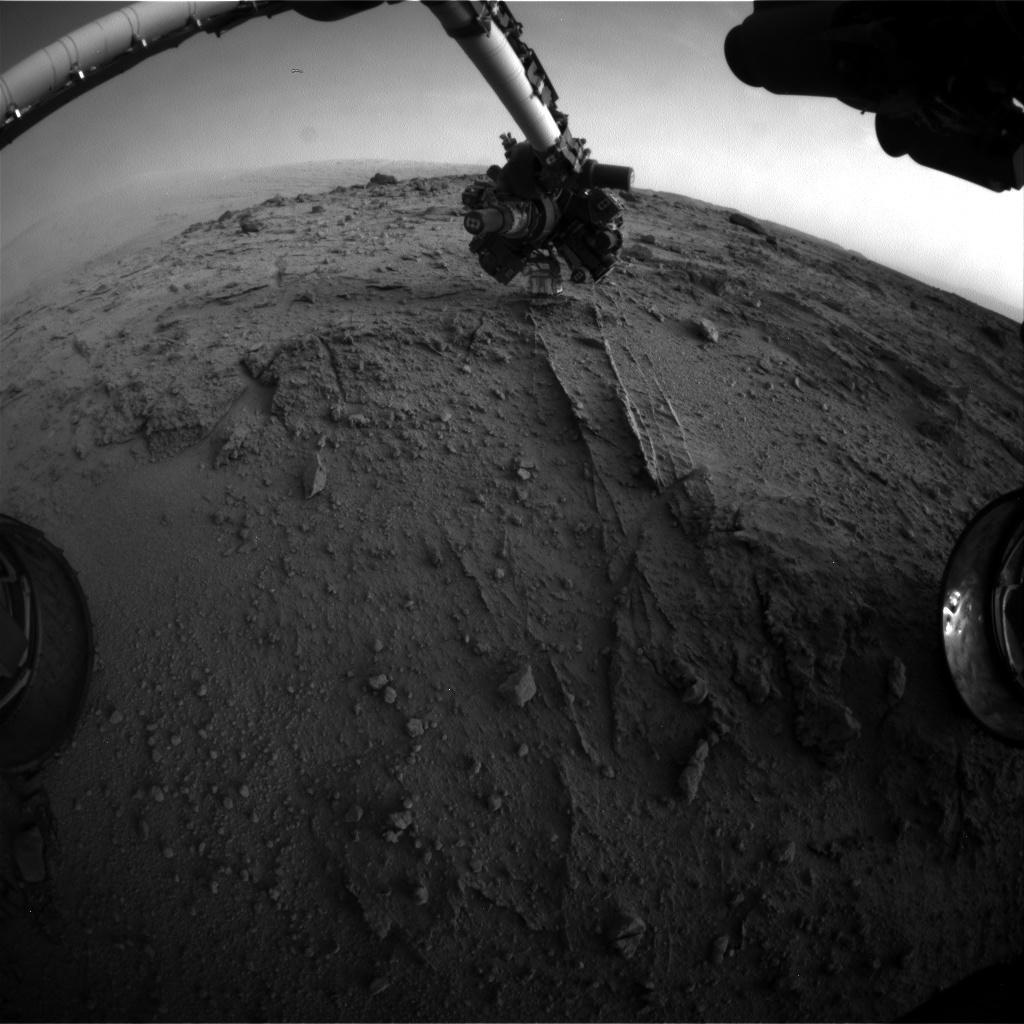 This image shows the view from NASA&#039;s Mars rover Curiosity after it uses an autonomous proximity placement technique to place its tool-laden robotic arm on a rock science target called &#039;Darwin&#039; during the 399th Martian day, or sol, of its mission. Image r