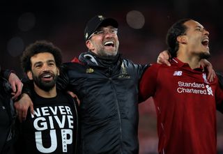 Mohamed Salah, left, was forced to sit out the match