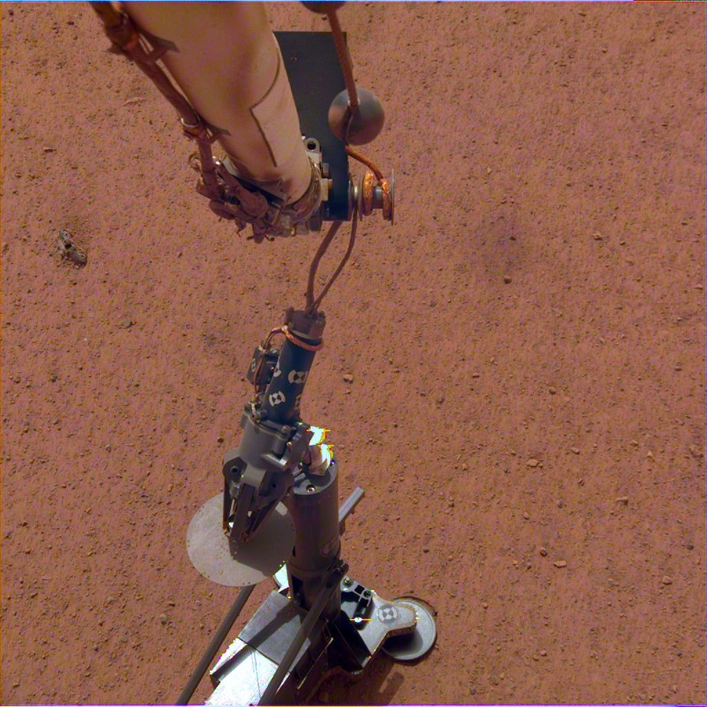 NASA&#039;s InSight lander deploys its heat probe on Mars on Feb. 12, 2019.