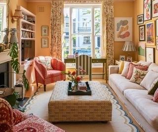 yellow painted living room with mix and match maximalist materials and decor