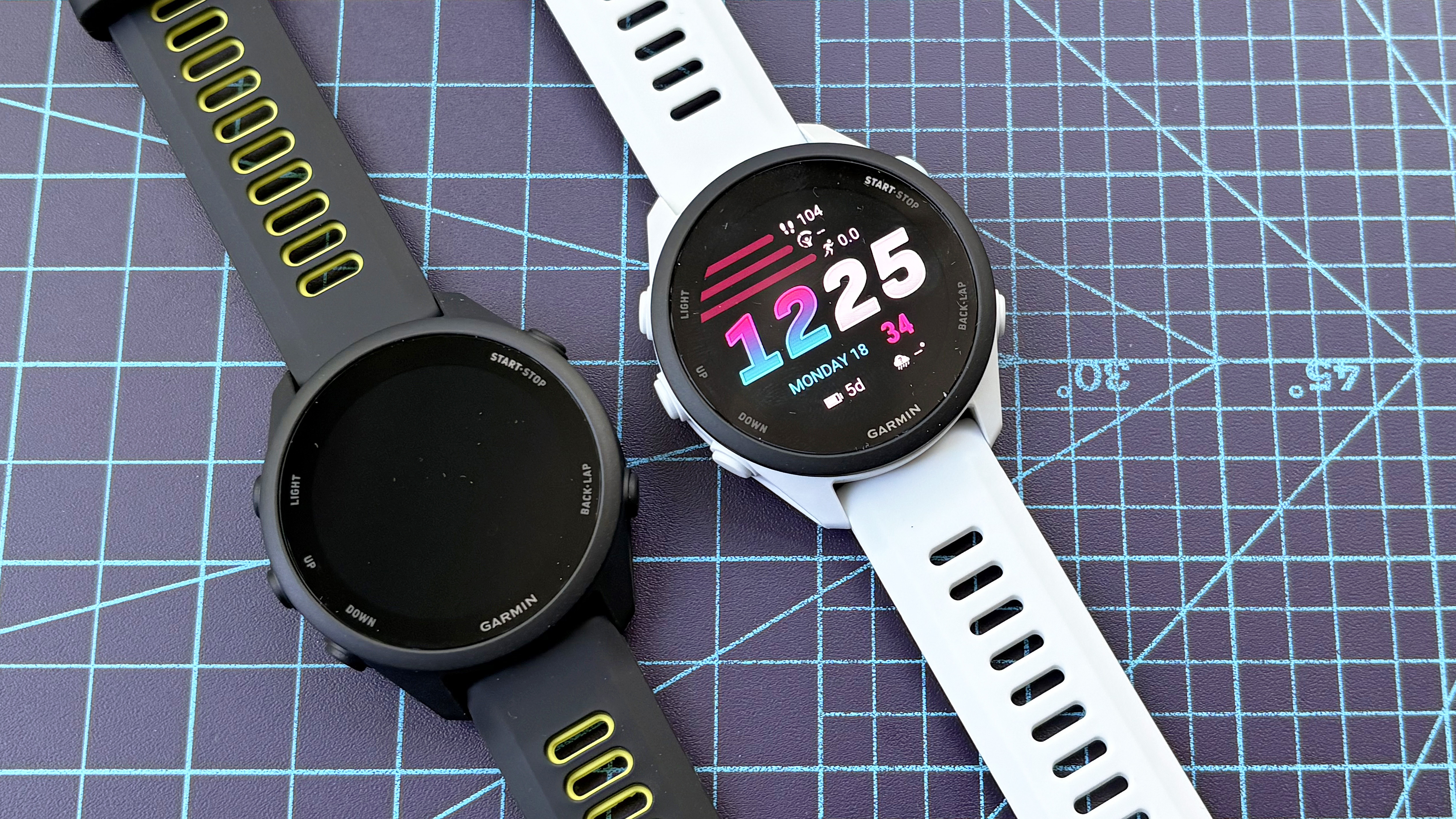 Close-up of the Garmin Forerunner 70 entry-level running watch in white
