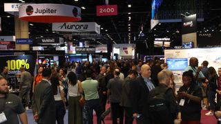 People mob the show floor at InfoComm 2023, 