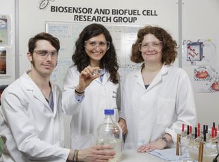 Researchers developed a new fuel cell that is powered by urine. Left to right: Jon Chouler, Mirella Di Lorenzo and Petra Cameron.
