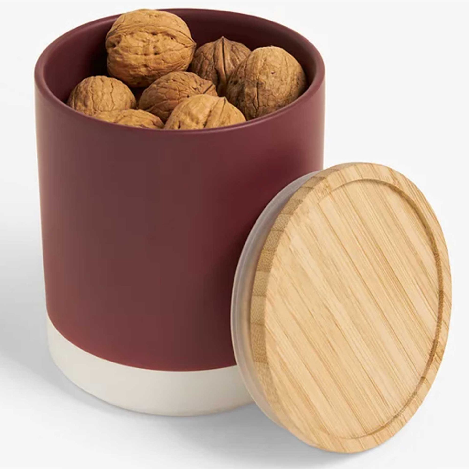 stone kitchen storage jar with wooden lid