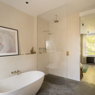 Minimalism bathroom with bath tub and walk-in shower