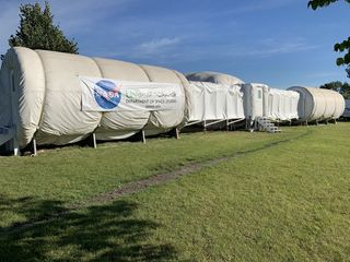 NASA Administrator Jim Bridenstine toured this NASA-funded University of North Dakota facility, which is called the Inflatable Lunar-Mars Analog Habitat, on Sept. 4, 2019. UND runs several simulated space missions a year in this habitat, including "spacewalks" in pressurized spacesuits and "excursions" using a small rover. In a tweet accompanying this picture, Bridenstine said, "Experiments conducted here will help us learn how to live and work on another world. This is the only system of its kind in the nation on a university campus."