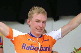 Tom-Jelte Slagter (CT Rabobank) celebrates his title victory on the podium.