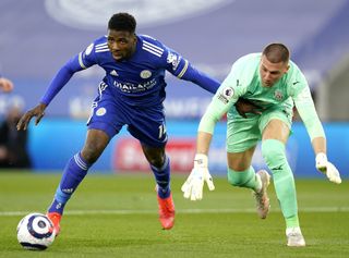 West Bromwich Albion goalkeeper Sam Johnstone (right) and Leicester City’s Kelechi Iheanacho battle for the ball during the Premier League match at the King Power Stadium, Leicester. Picture date: Thursday April 22, 2021