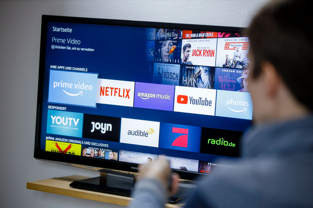 BERLIN, GERMANY - FEBRUARY 21: Symbol photo: The logos of the streaming services Amazon Prime Video, Netflix, amazon music and youtube can be seen on a television on February 21, 2020 in Berlin, Germany. (Photo by Thomas Trutschel/Photothek via Getty Images)