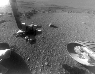 This late-afternoon view from the Mars rover Opportunity's front hazard camera, taken in January 2018, shows a pattern of rock stripes on the ground, a surprise to mission scientists.