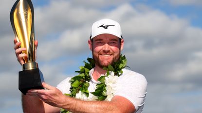 Grayson Murray with the trophy after his win in the 2024 Sony Open