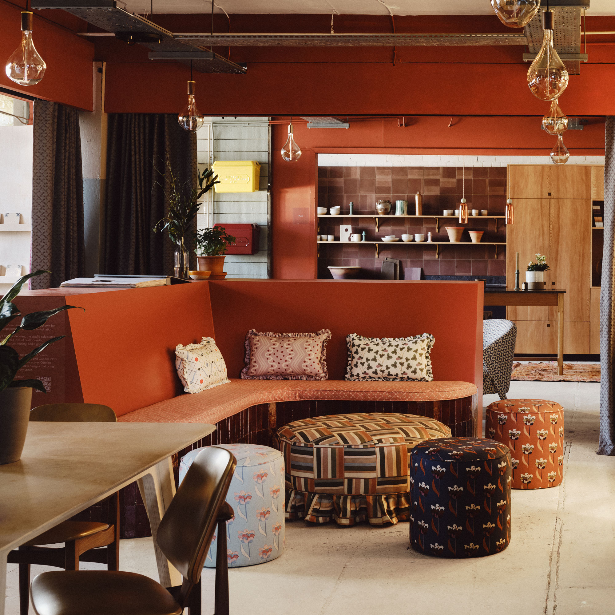 Banquet seating painted in Farrow and Ball Bamboozle.