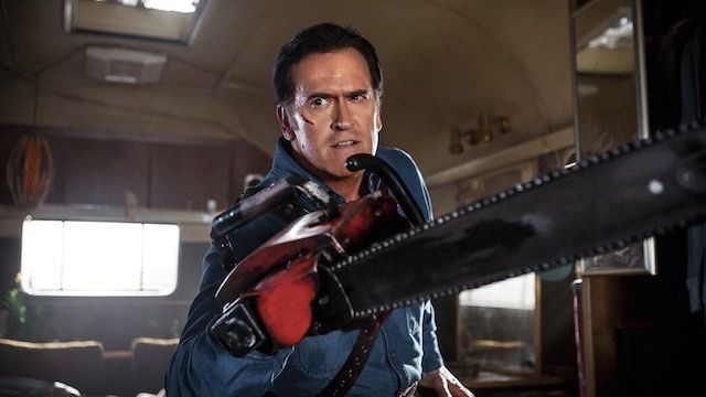 Ash from Evil Dead with a chainsaw