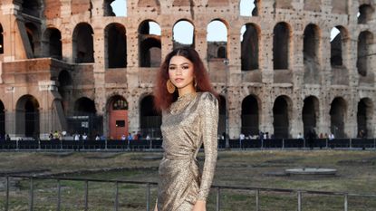 Clothing, Street fashion, Beauty, Fashion, Dress, Temple, Outerwear, Architecture, Tourism, Fashion model, 