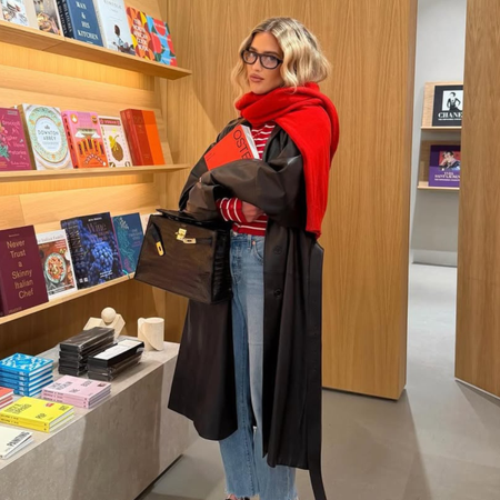 woman wearing leather trench coat jean outfit spring 2026