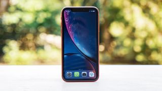 iPhone XR stood up outside