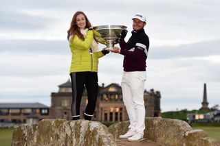 Hatton and wife hold a trophy