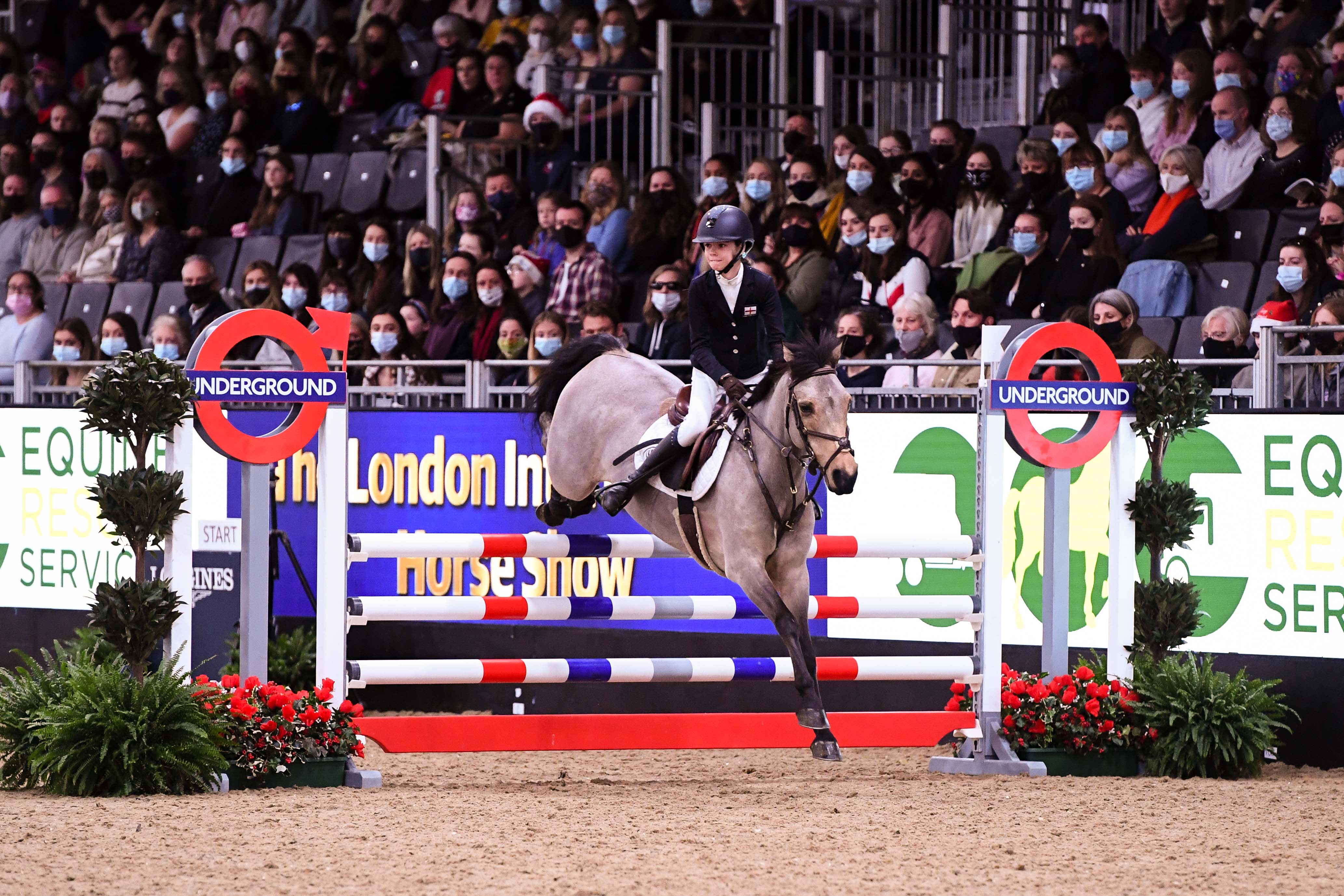Cate Kerr and Dunbarover at London Horse Show