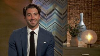 Joey Graziadei in a suit in Season 28 of The Bachelor