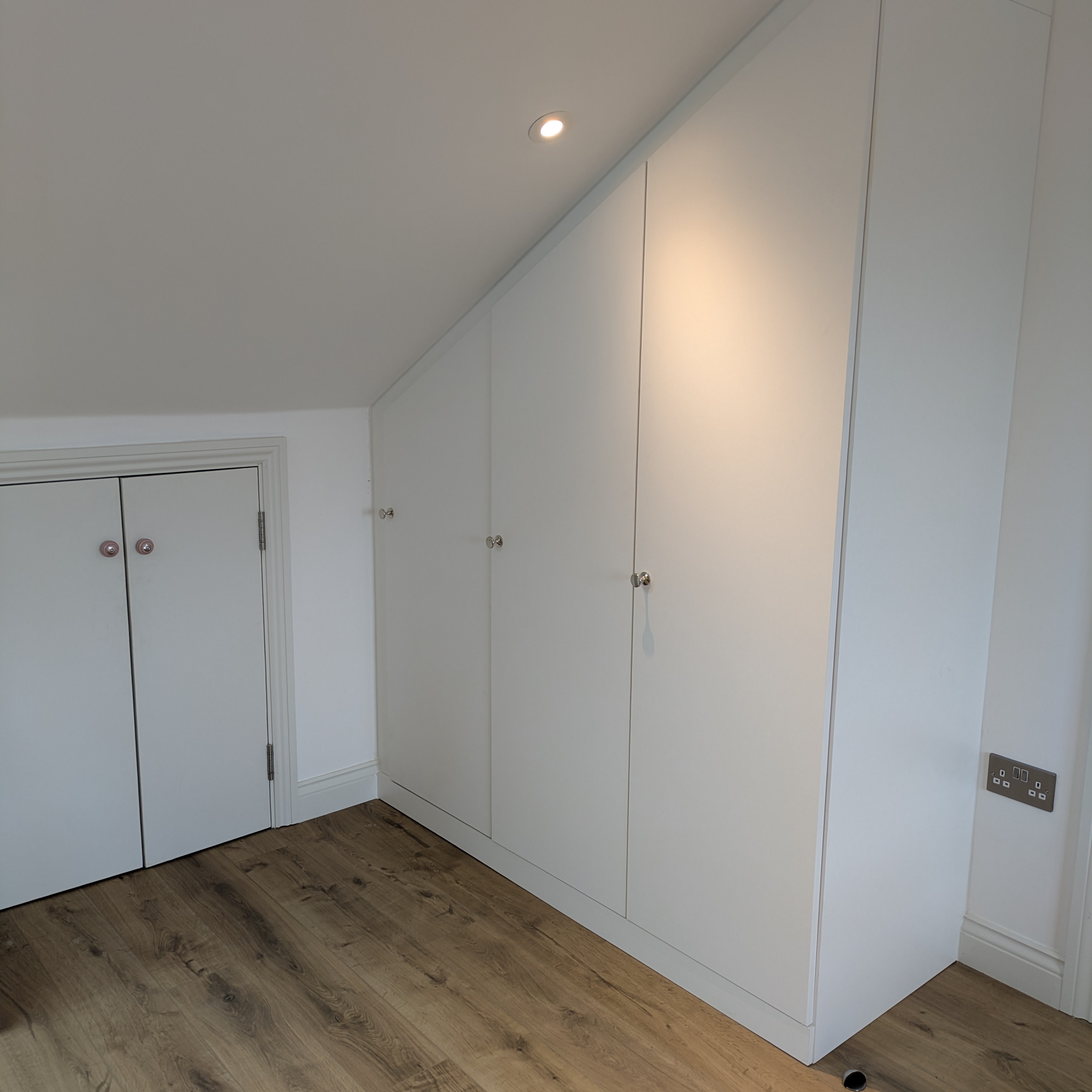Fitted wardrobe in loft bedroom